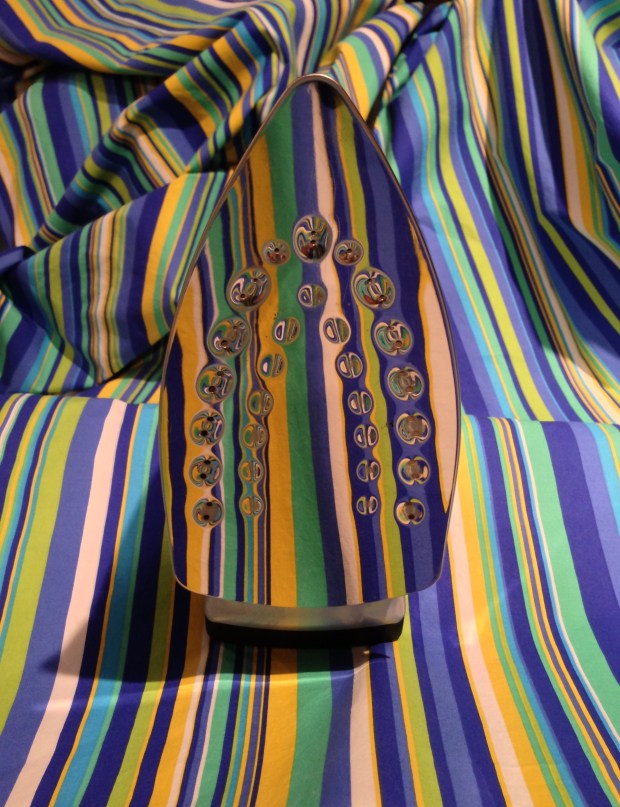 bed in bright stripes